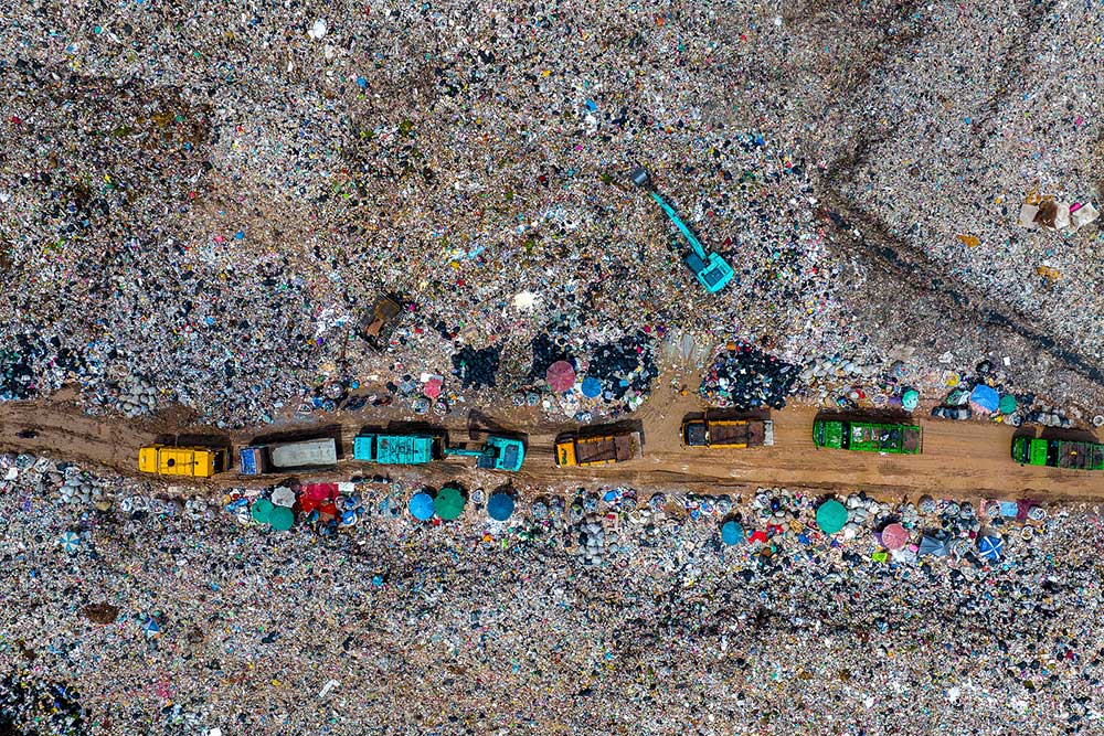 Garbage Trucks Unload Garbage